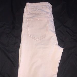 Dusty rose ripped jeans